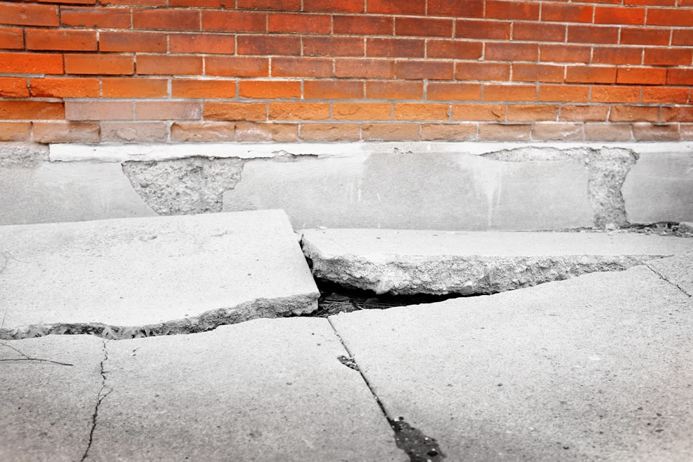 $200,000.00 – For a 50-year-old woman who tripped and fell on a piece of broken sidewalk and sustained a broken wrist.
